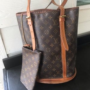 Louis Vuitton GM bucket bag with pouch.